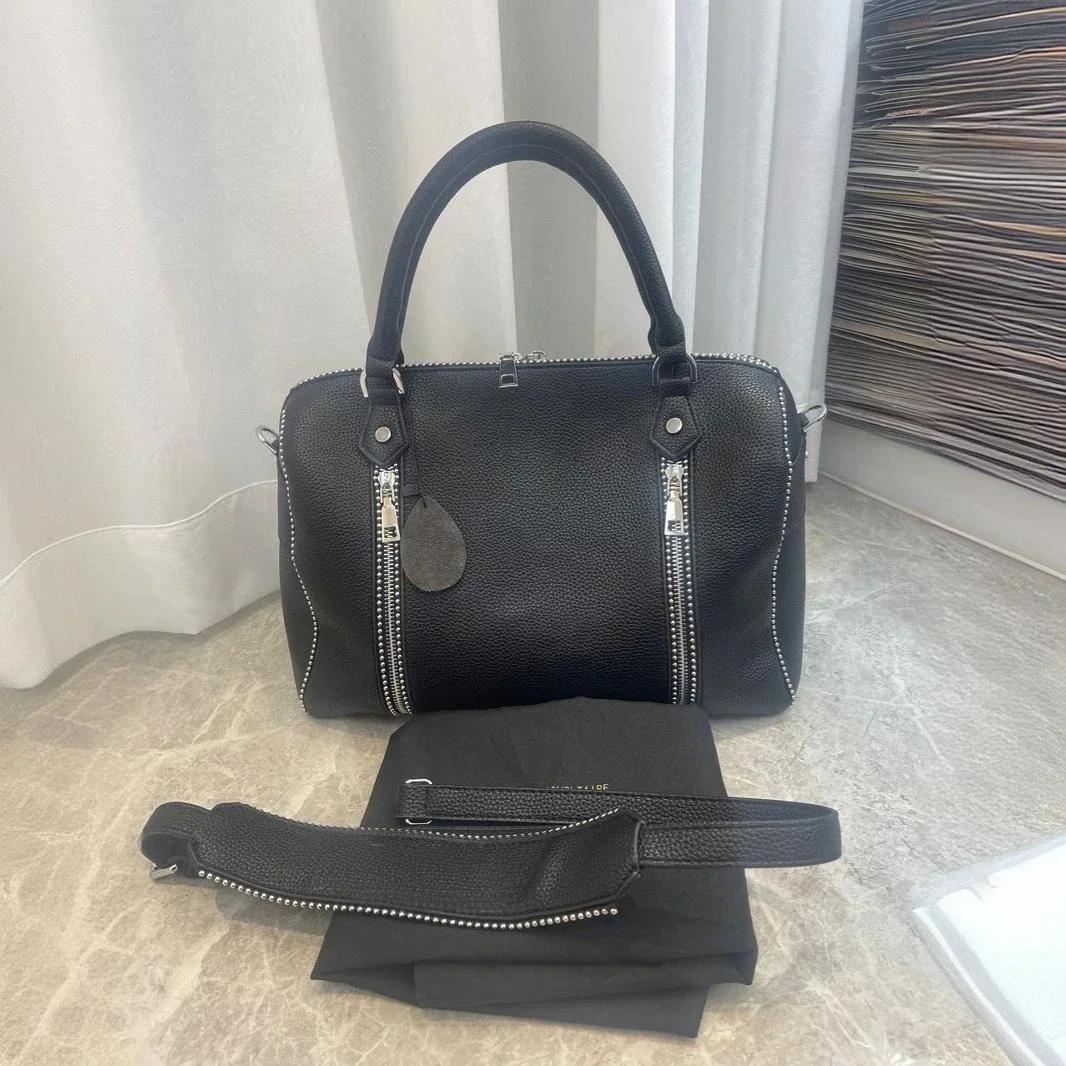 Sac à main seau en cuir noir à motif litchi, classique français, nouvelle collection 2026, pour femm