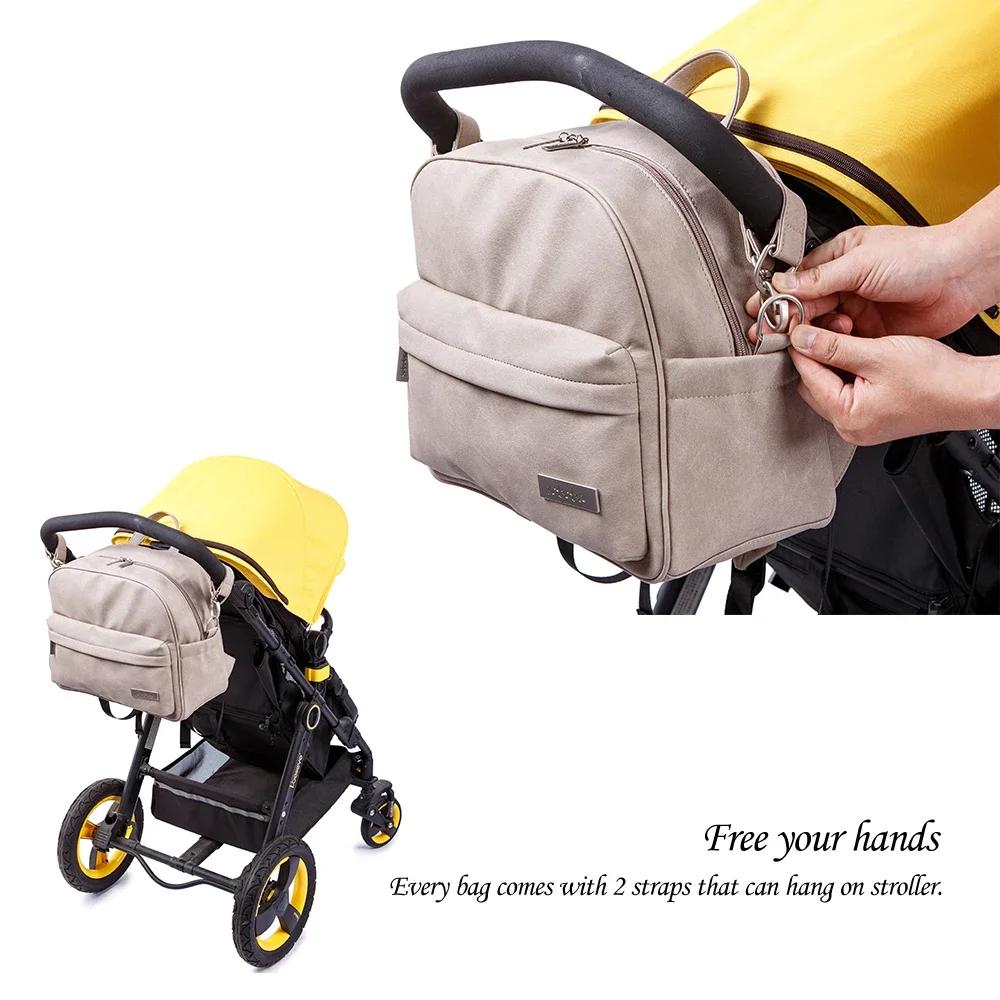 Sac à dos à couches imperméable multifonction - Style et praticité pour les soins de bébé