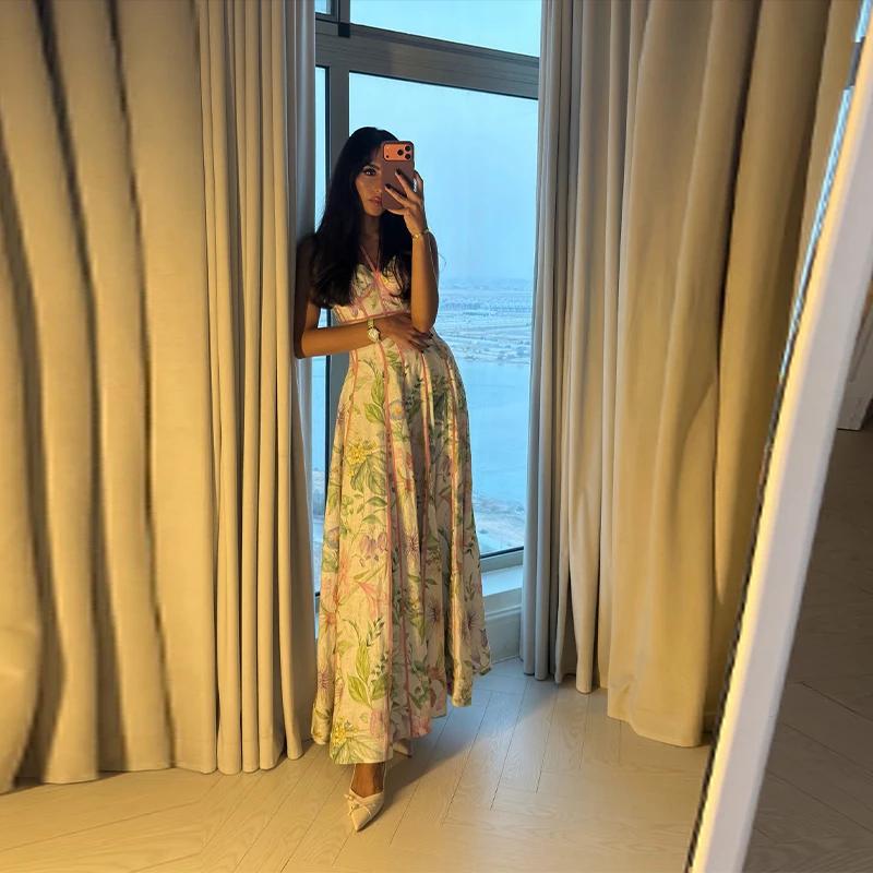Robe longue élégante à imprimé floral pour femme, taille cintrée, ourlet à volants, idéale pour l'ét