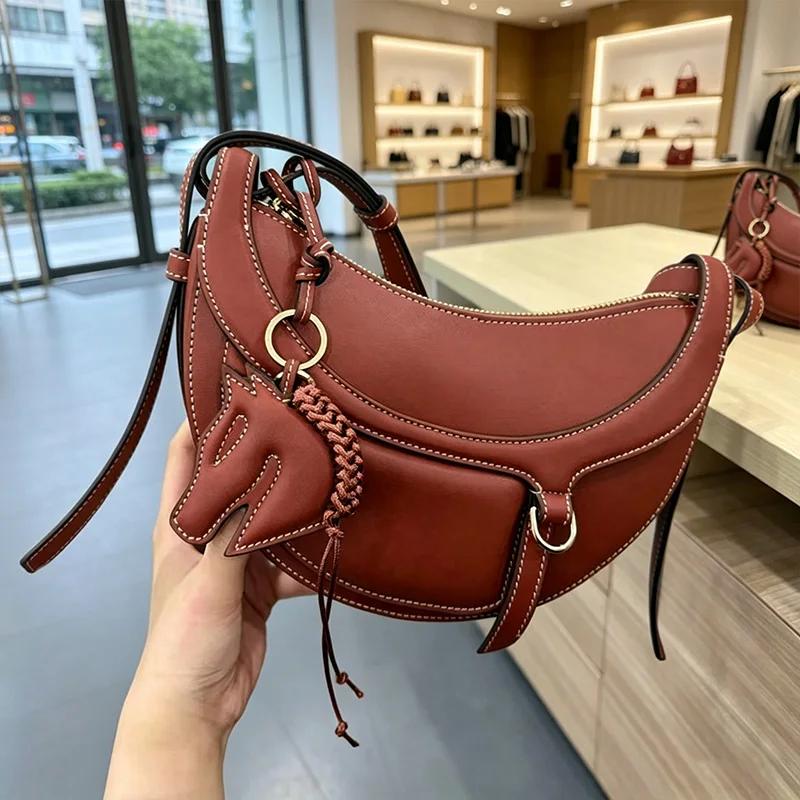 Nouveau sac à bandoulière et sac croisé demi-lune en cuir véritable pour femme 2026, idéal pour le q