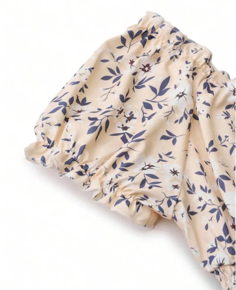 Robe florale vintage avec poignets moelleux et taille plissée, adaptée aux vêtements de plage d'été 
