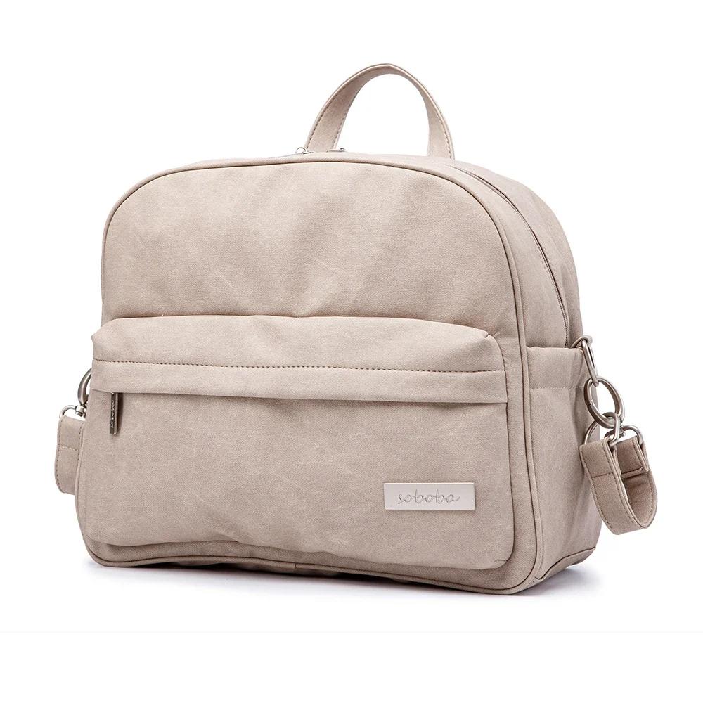 Sac à dos à couches imperméable multifonction - Style et praticité pour les soins de bébé