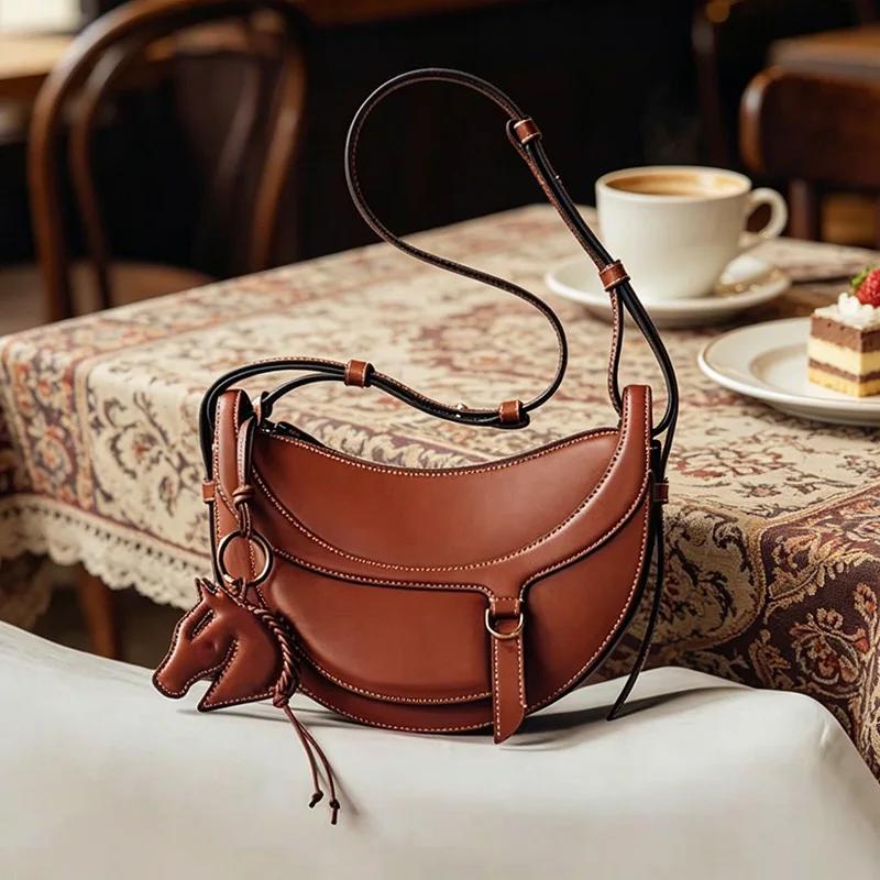 Nouveau sac à bandoulière et sac croisé demi-lune en cuir véritable pour femme 2026, idéal pour le q