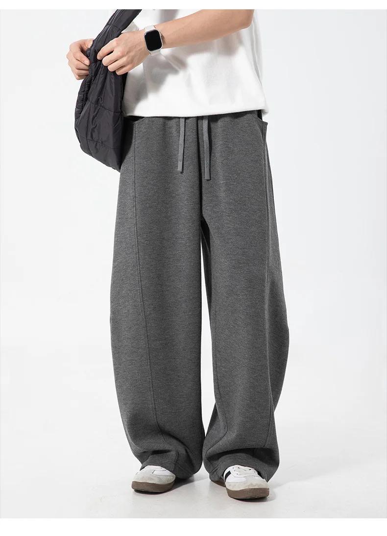 Pantalon décontracté texturé à coutures fendues pour hommes, surdimensionné, jambes incurvées, drapé