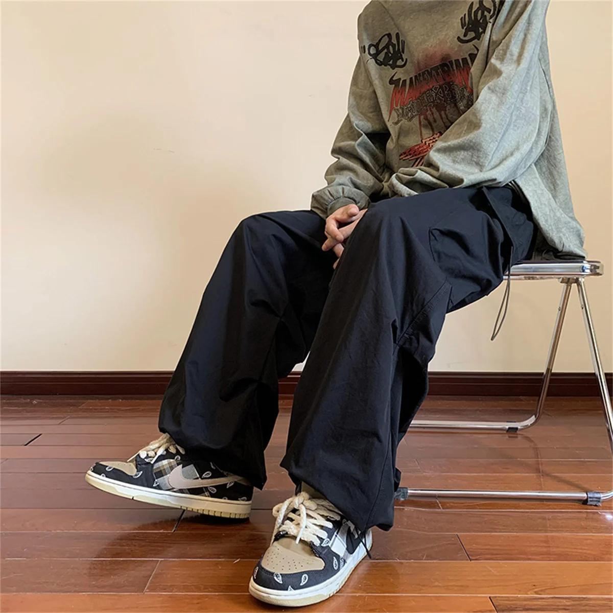 Streetwear 2024 printemps sarouel pantalons décontractés hommes taille élastique couleur unie Cargo 
