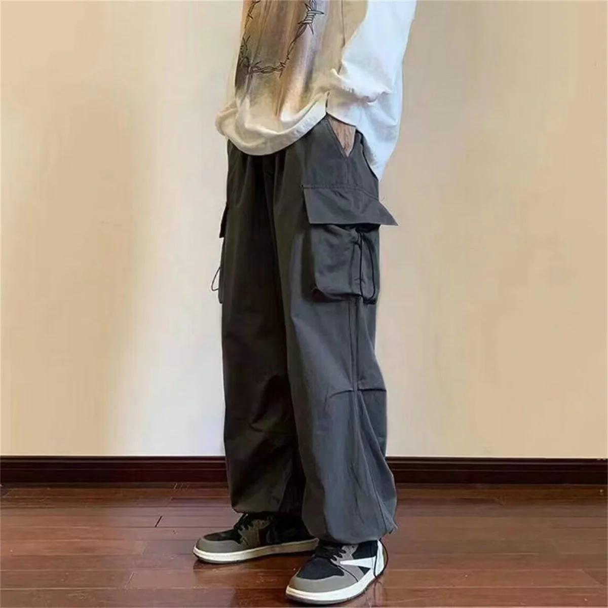 Streetwear 2024 printemps sarouel pantalons décontractés hommes taille élastique couleur unie Cargo 