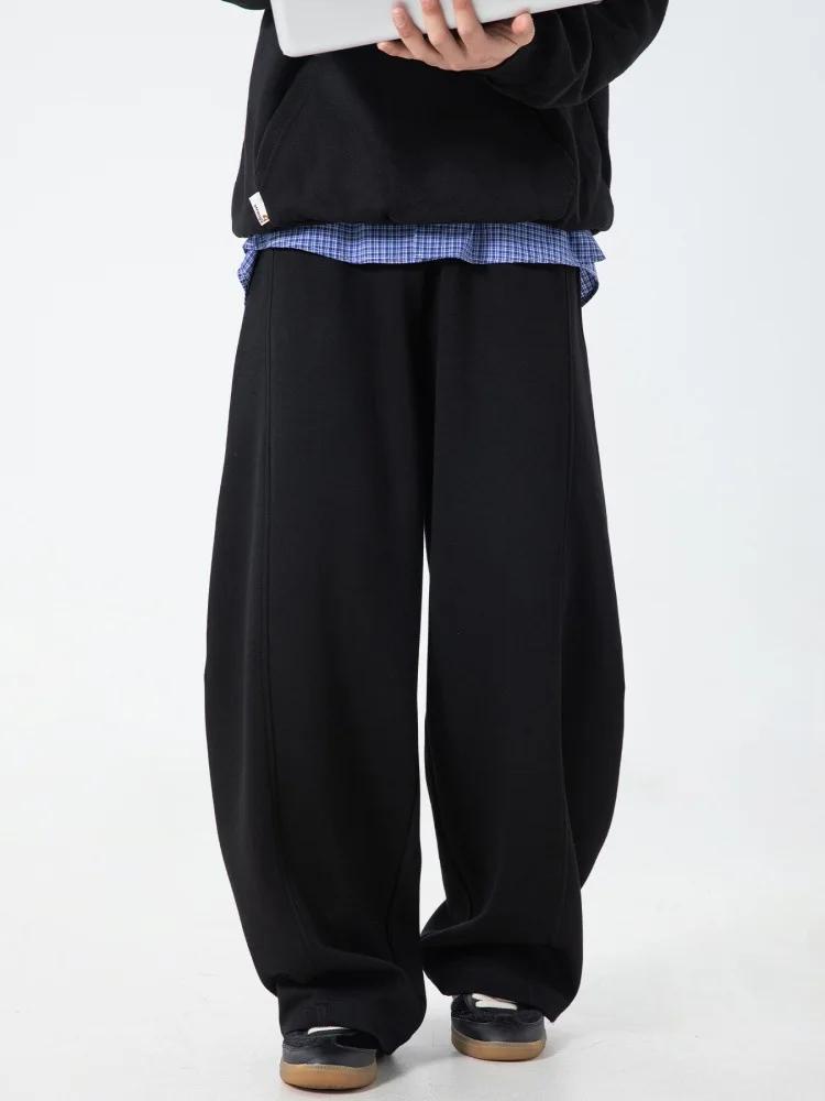 Pantalon décontracté texturé à coutures fendues pour hommes, surdimensionné, jambes incurvées, drapé
