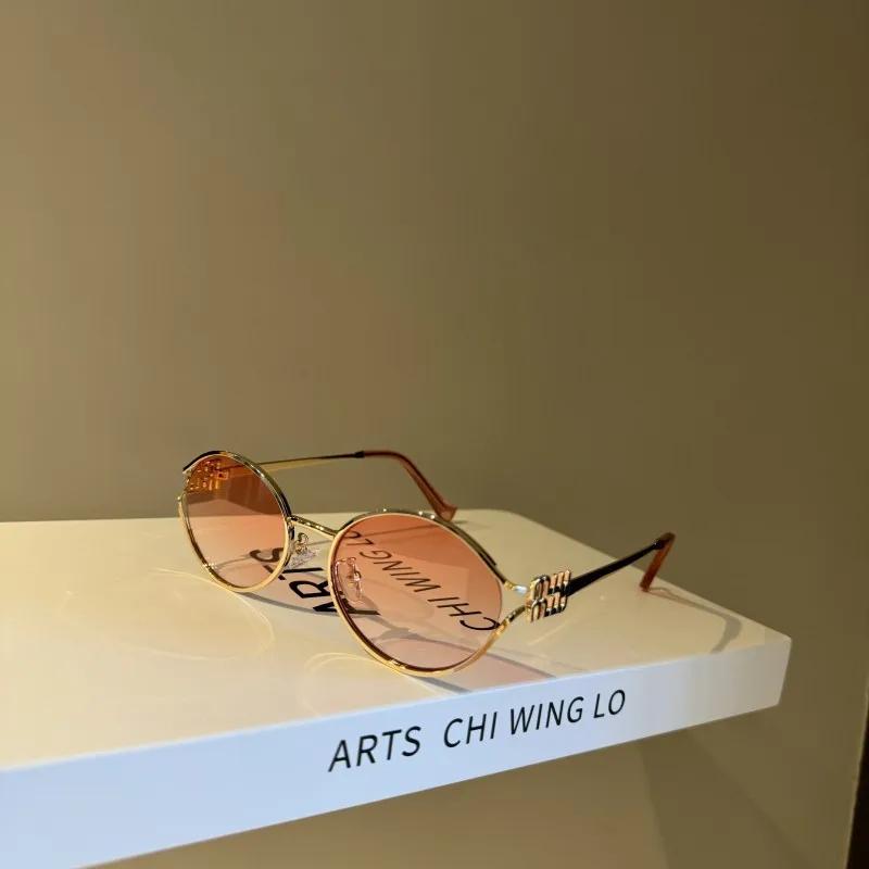 Nouvelle marque de mode lunettes de soleil ovales pour femmes rétro petit cadre femme homme métal lu