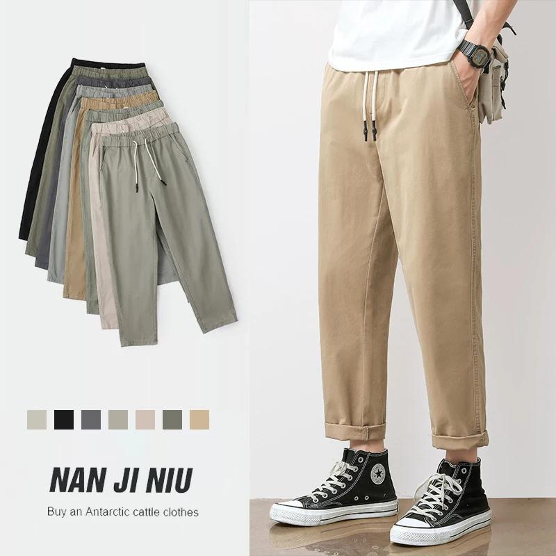 Pantalon décontracté pour homme en coton respirant, couleur unie gris kaki, idéal pour le printemps