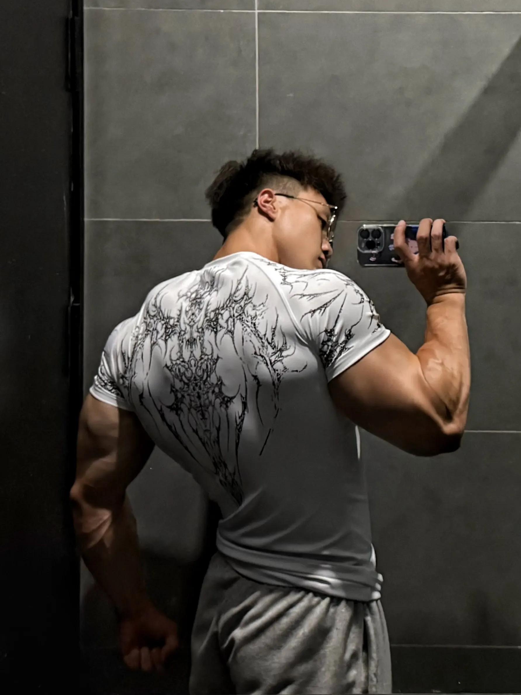 T-shirt de sport pour homme à séchage rapide, col rond, compression, manches courtes, pour la course