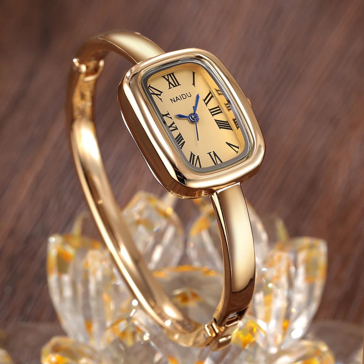 Montre pour femme décontractée, polyvalente, simple et à la mode avec affichage à l'échelle romaine