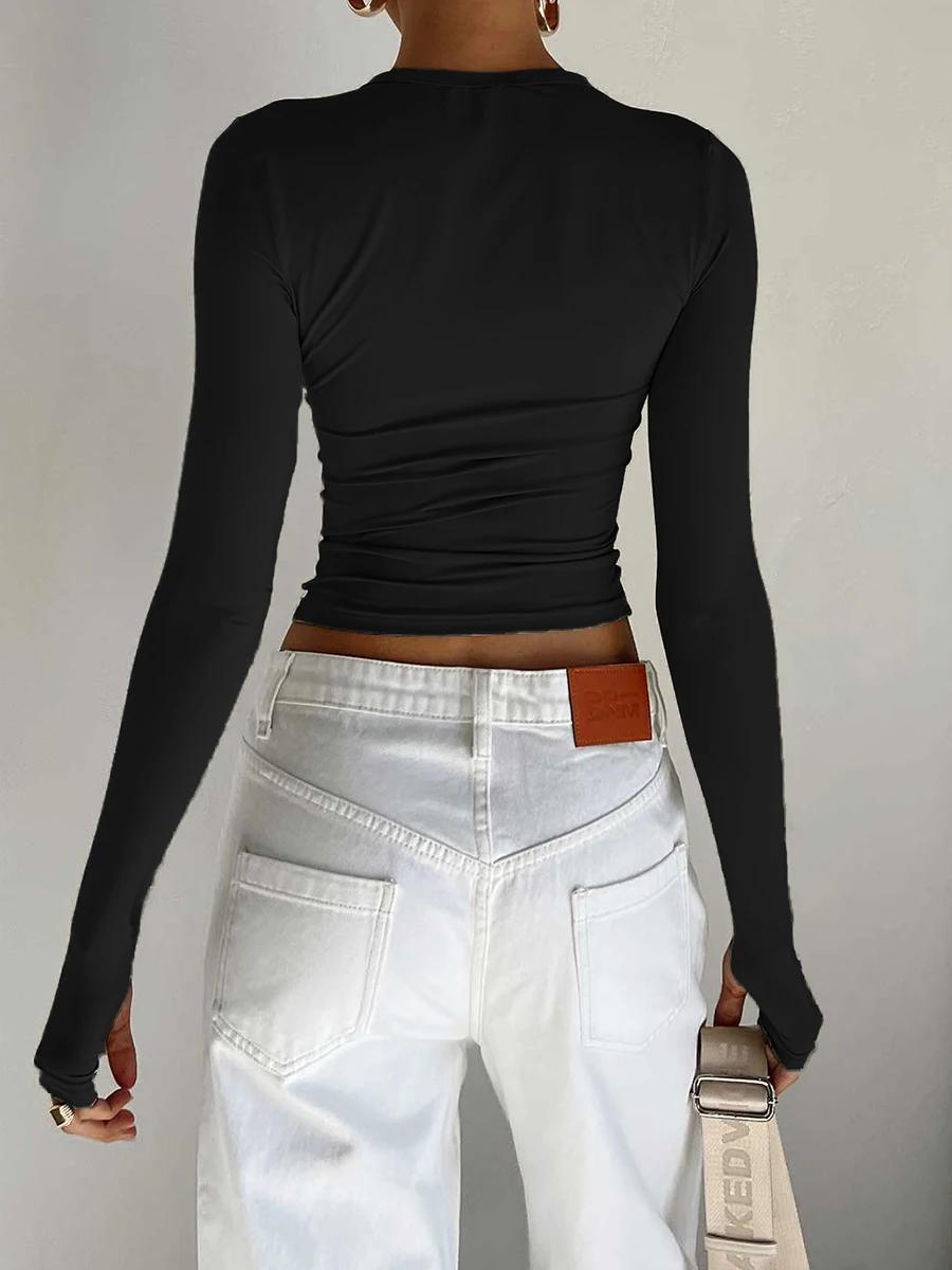 Mode femmes T-shirt à manches longues col rond solide coupe ajustée dames haut court avec trous pour