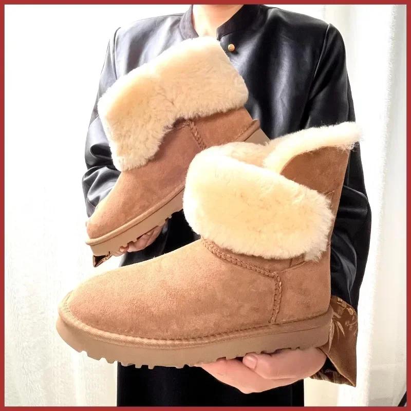 Une paire de bottes de neige en pure peau de mouton et laine pour femme, chaudes et confortables. Ch