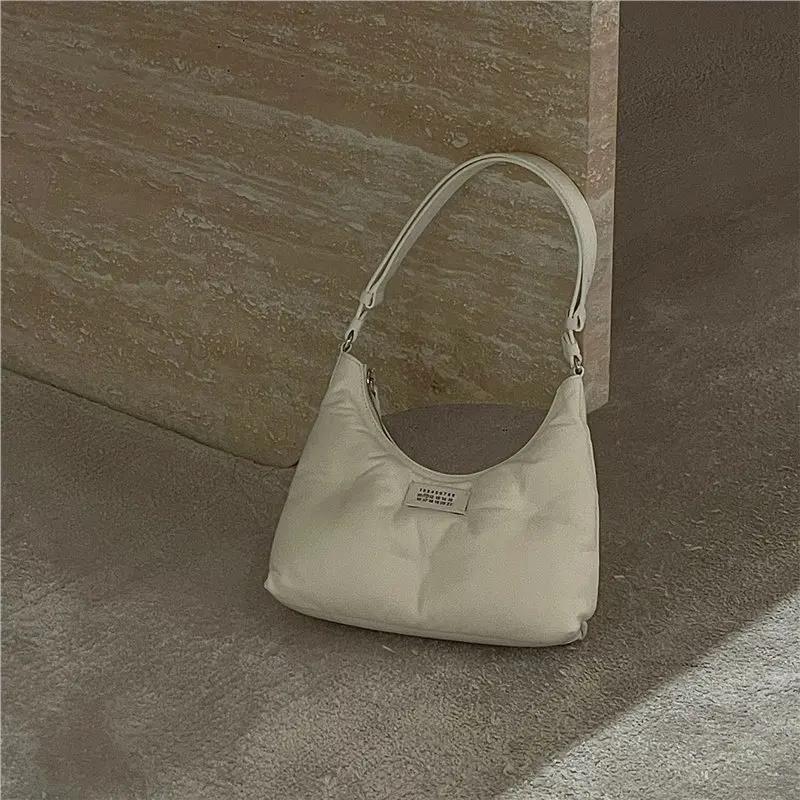 Niche en cuir véritable mode polyvalente plaque de cuisson Mini sous les bras chaîne sac bandoulière