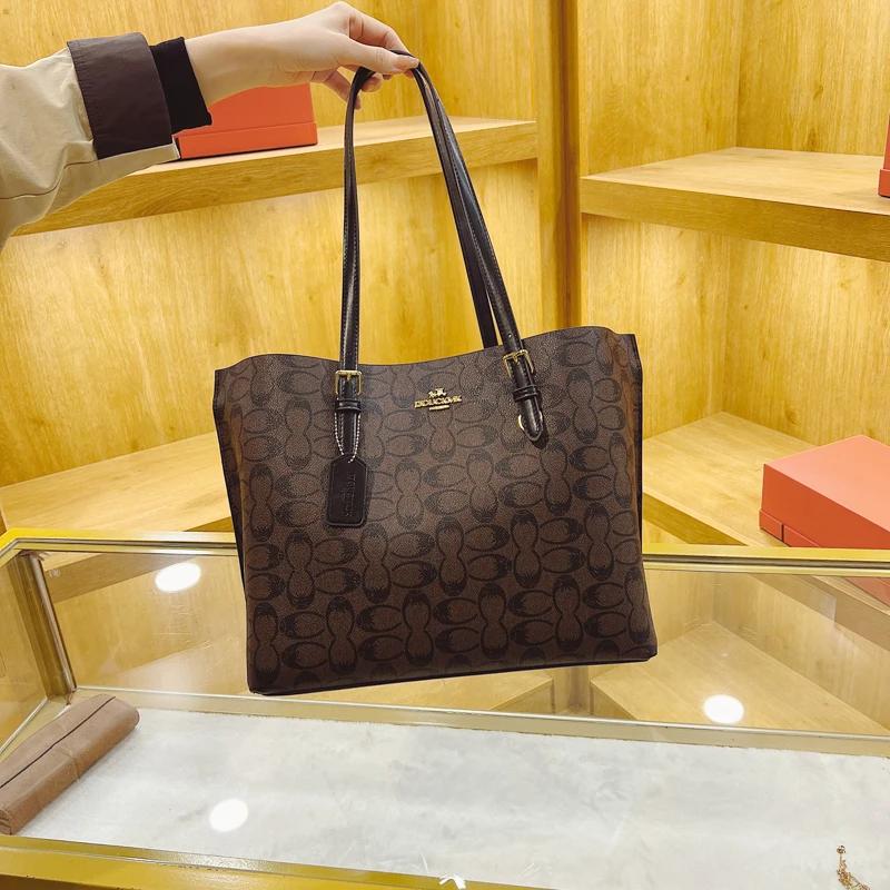 Sac à langer bandoulière tendance en cuir haut de gamme, style classique de créateur, décontracté, s