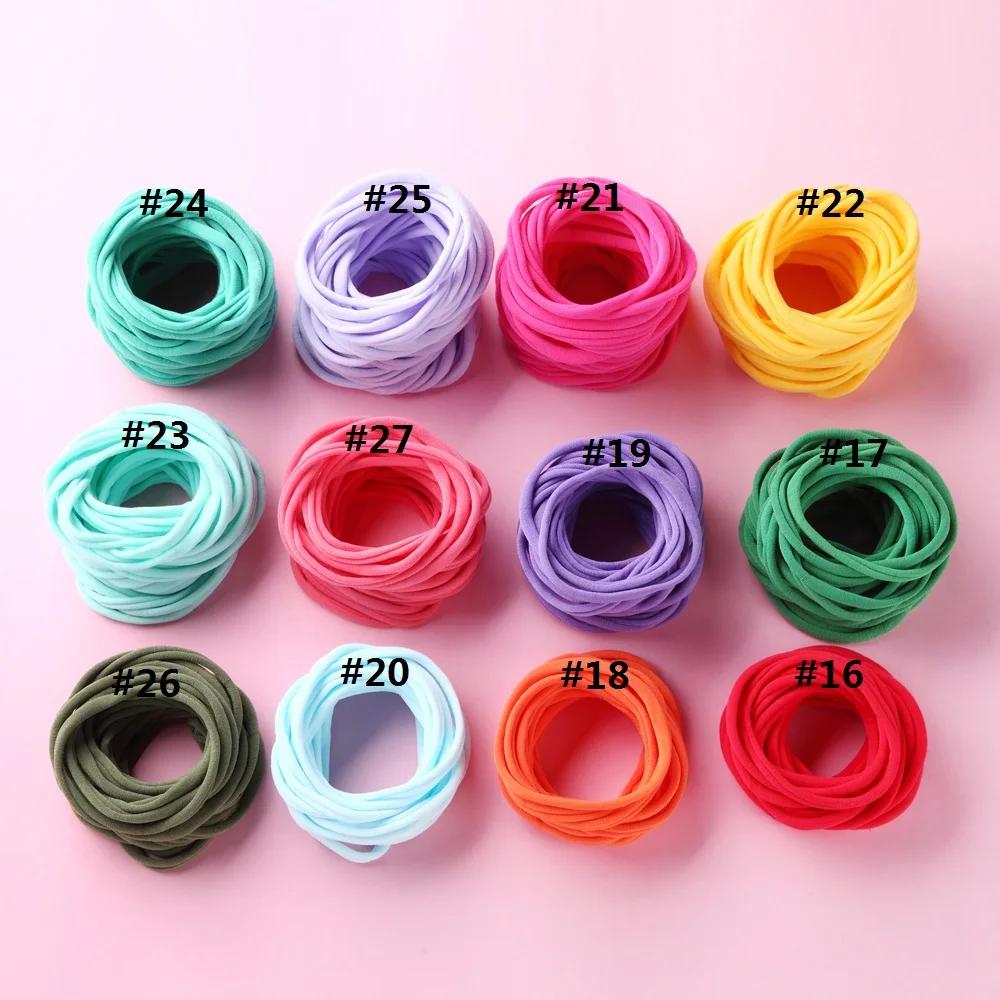 20 pièces/lot bébé fille bricolage bandeaux en Nylon doux sans trace bandeau extensible pour enfants