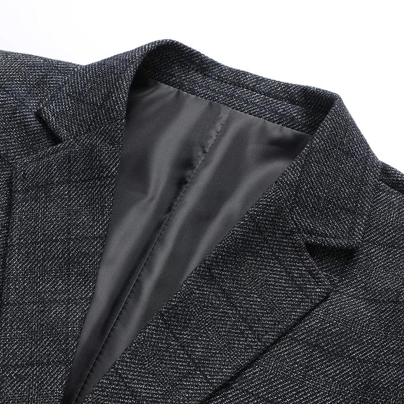 Le nouveau blazer classique rayé, style business casual, avec poches, convient à un usage quotidien