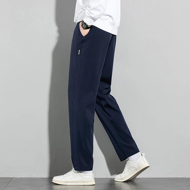 Pantalons pour hommes en soie glacée 2025 été nouveau noir gris mince pantalons décontractés d'affai