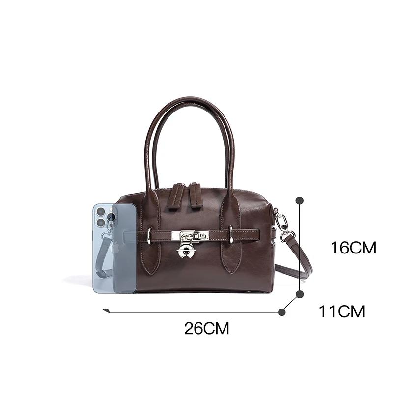 Sac à main Boston en cuir de Grain pour femmes, sac à main spacieux avec serrure, sac à bandoulière