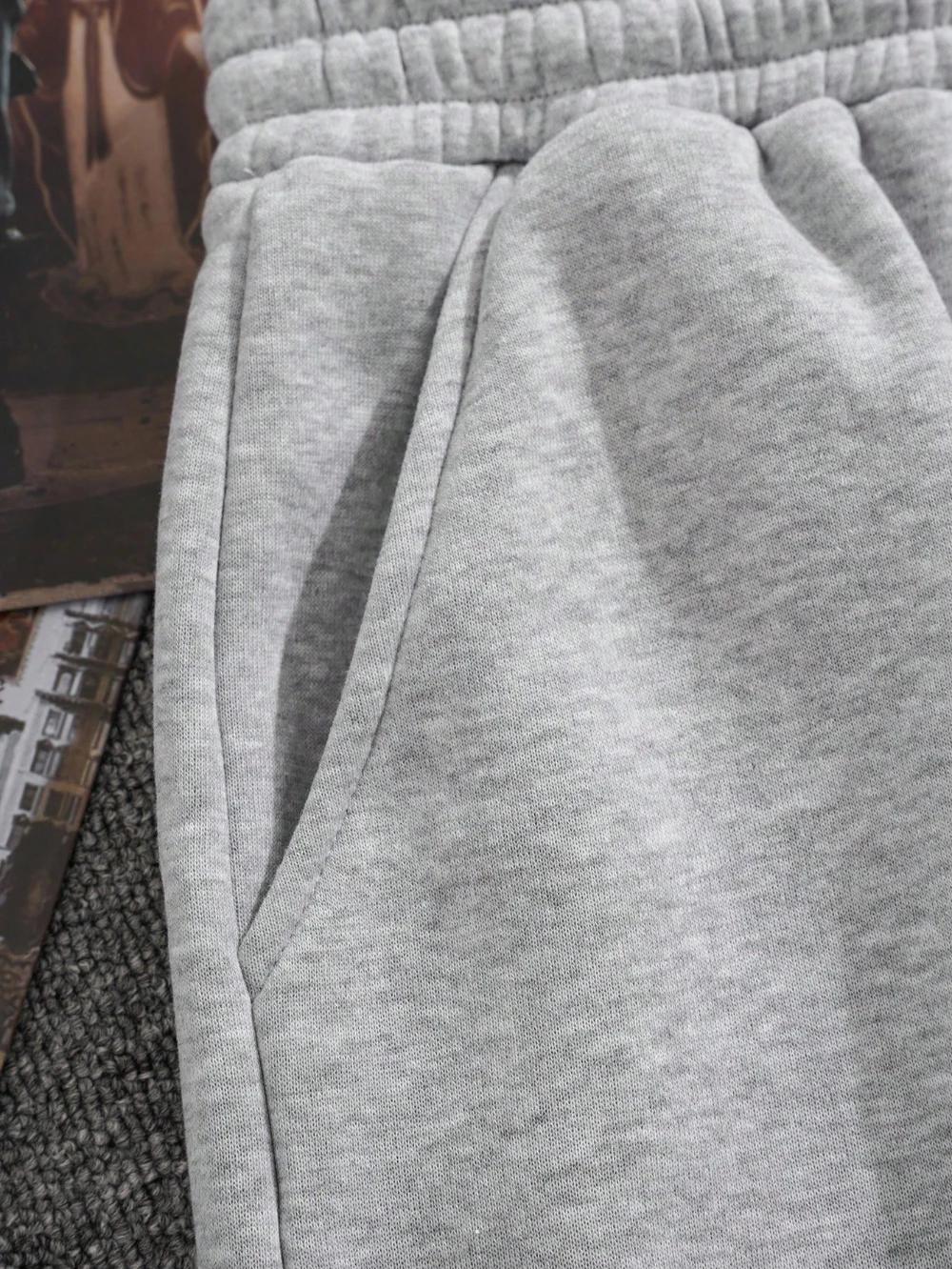 Shorts amples décontractés pour hommes, couleur unie, avec poches obliques, style estival élégant et