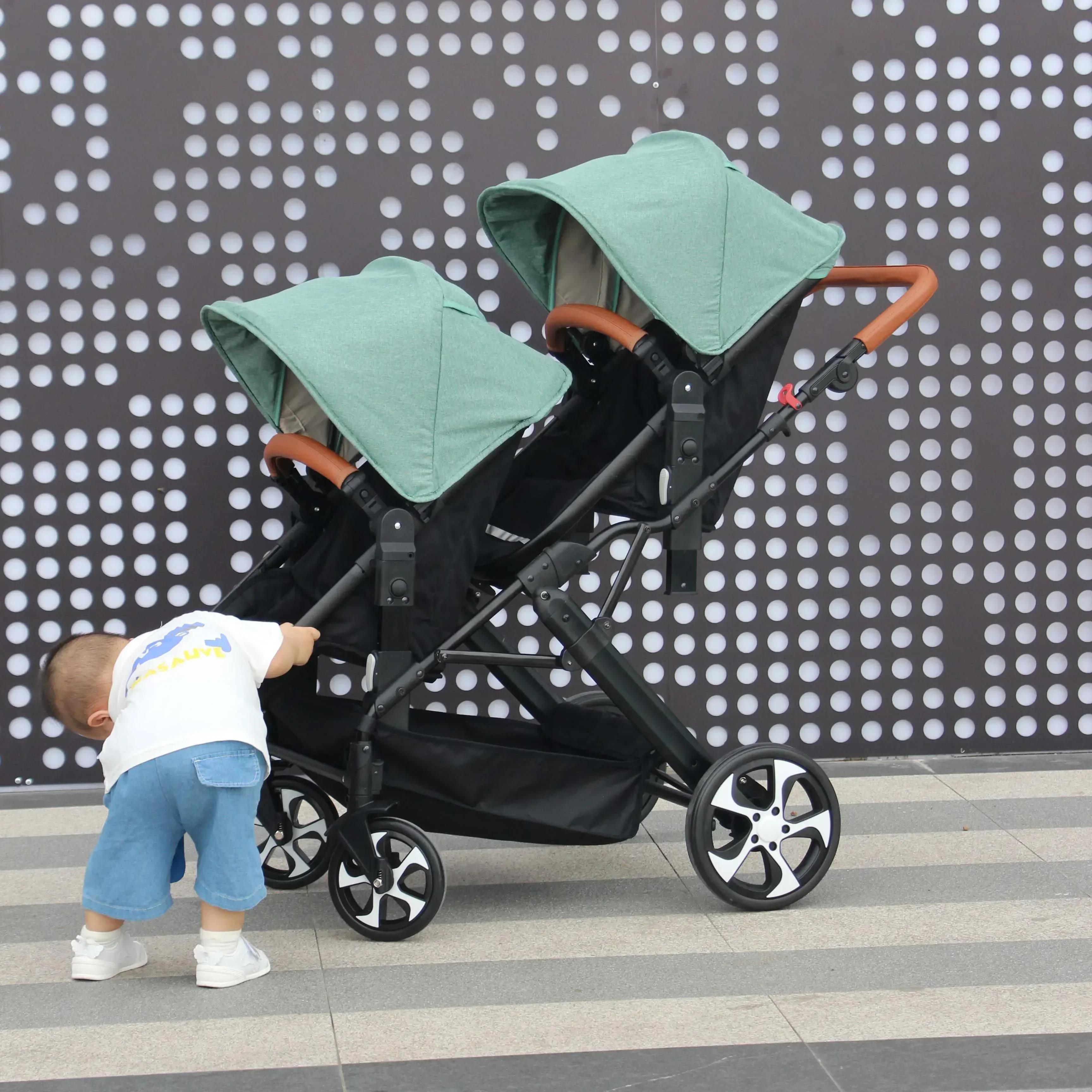 2025 Nouvelle poussette trois-en-un jumeaux avec siège auto, pliable, légère, équipée de cadeaux