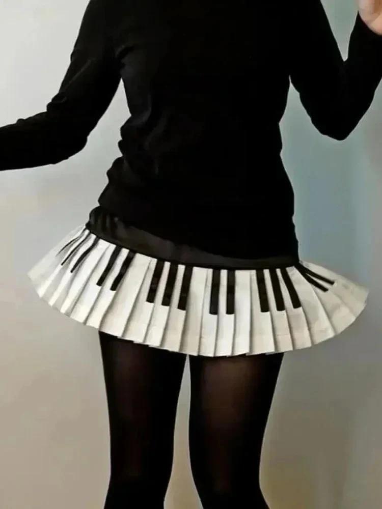 Printemps noir blanc épissé femmes jupe courte Y2k conception mince Harajuku Mini jupe femme Empire