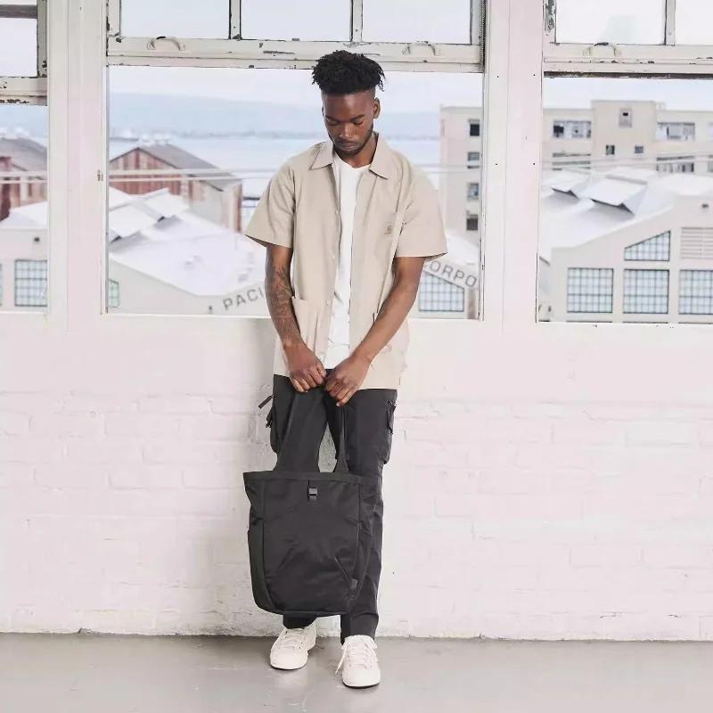 Go Tote 2 est simple, léger et facile à transporter. Sac fourre-tout de grande capacité, sac de rang
