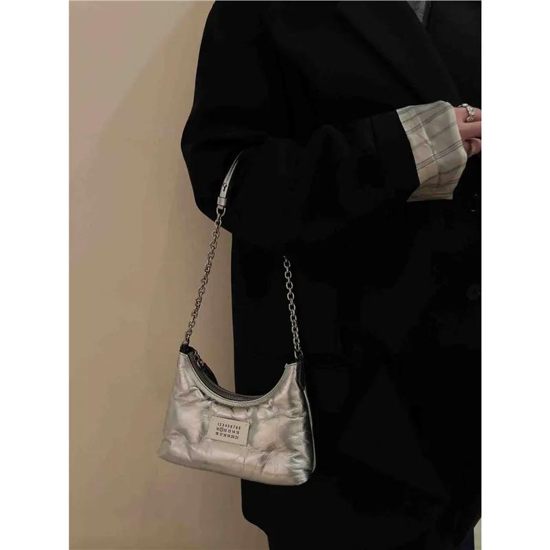 Niche en cuir véritable mode polyvalente plaque de cuisson Mini sous les bras chaîne sac bandoulière