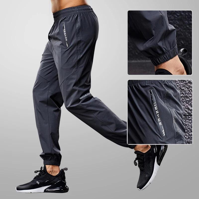 Pantalons de Sport à séchage rapide pour hommes, pantalons de course avec poches zippées, pantalons