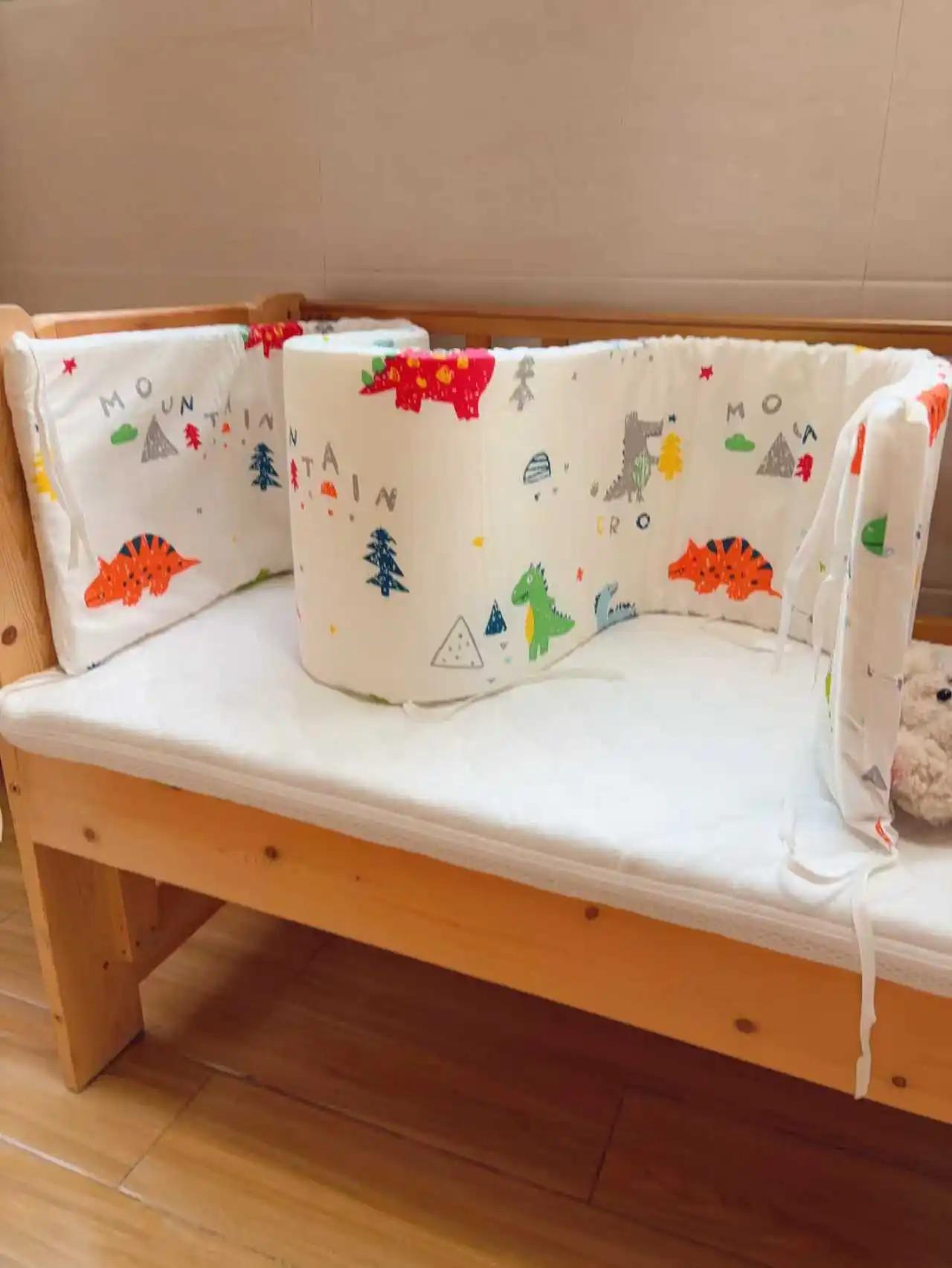 Un protecteur de lit de bébé adapté aux nouveau-nés, un protecteur de lit de bébé en coton avec mate