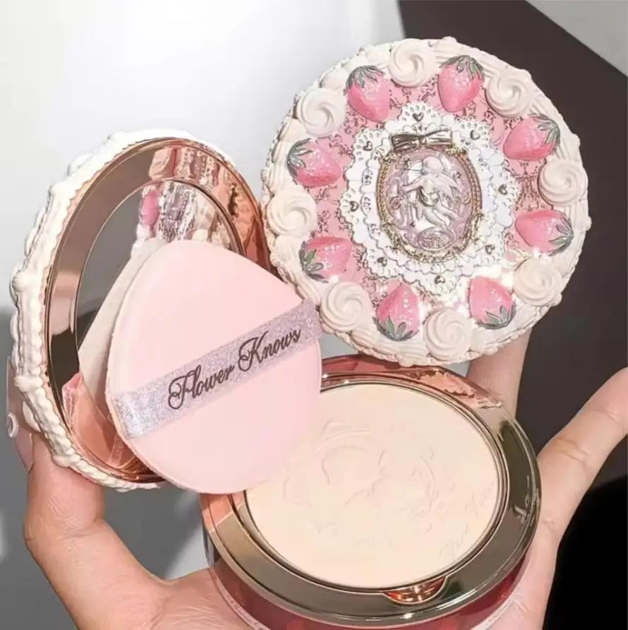La fleur connaît la série Cupidon aux fraises, poudre pressée mate, mise au point douce, poudre de m