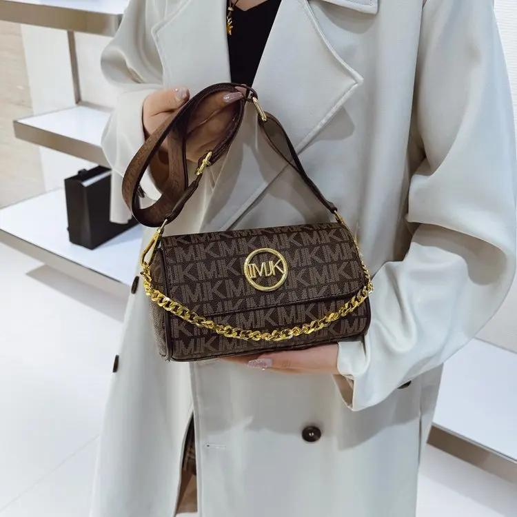 Sac à langer élégant en cuir classique populaire pour femmes, grande capacité, texturé, style rétro