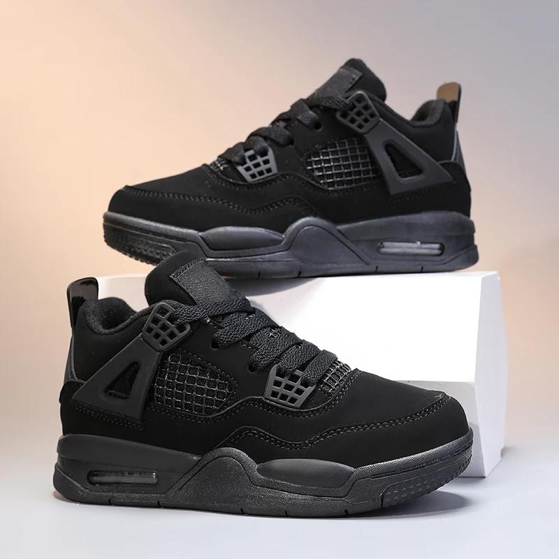 Une paire de chaussures d'entraînement sportives à tige en cuir pour enfants, chaussures décontracté