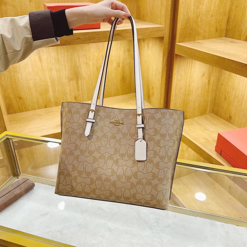 Sac à langer bandoulière tendance en cuir haut de gamme, style classique de créateur, décontracté, s