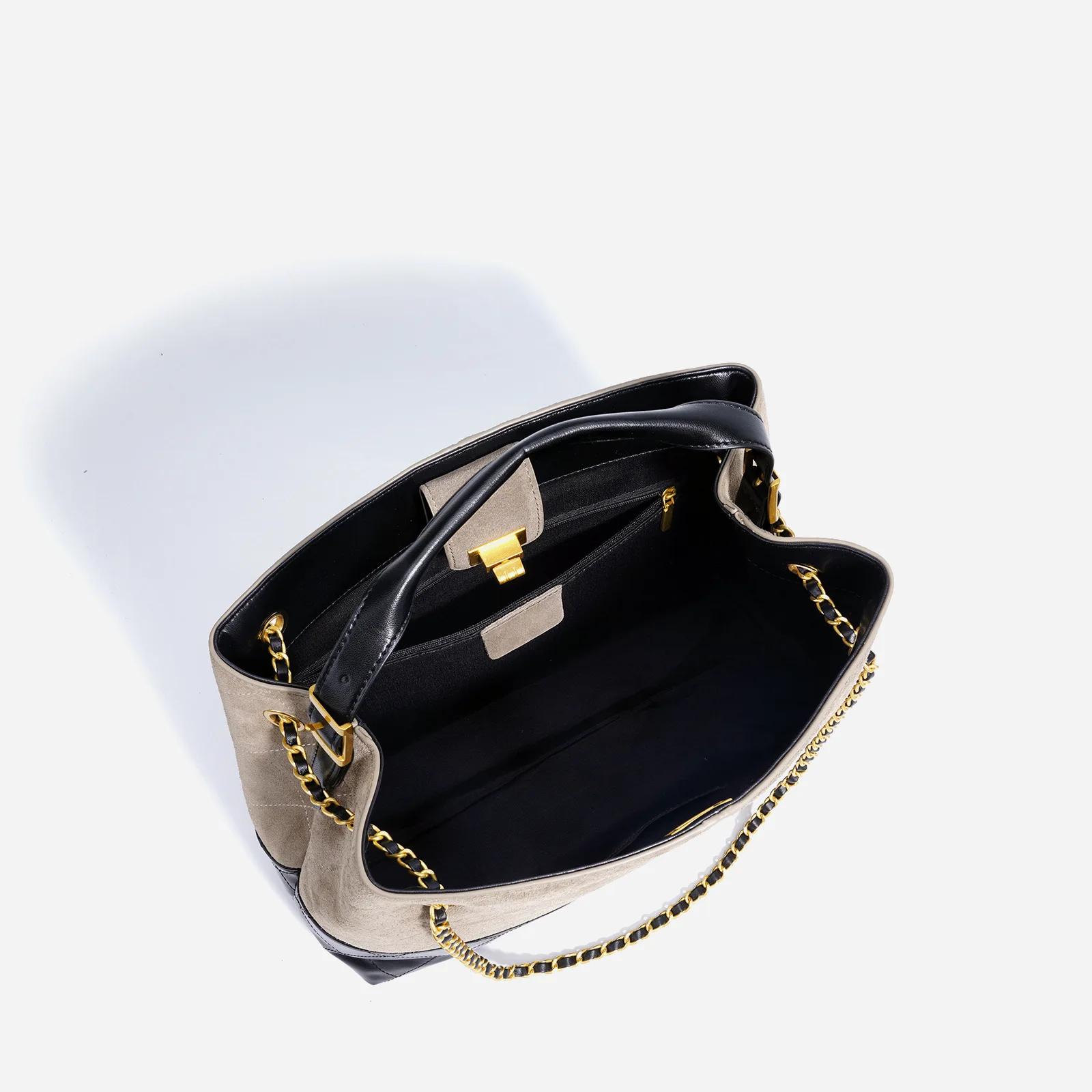 Sac à bandoulière minimaliste haut de gamme avec finition rétro texturée et intérieur spacieux, égal