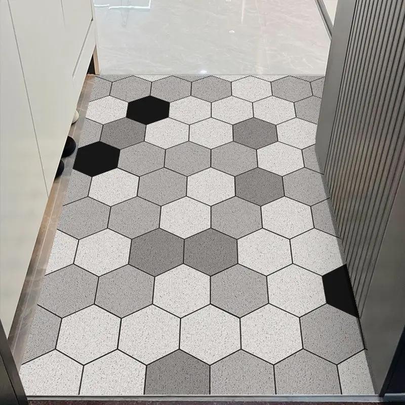 Le tapis de porte d'entrée peut être nettoyé avec un tapis de porte domestique en PVC. Le tapis d'en