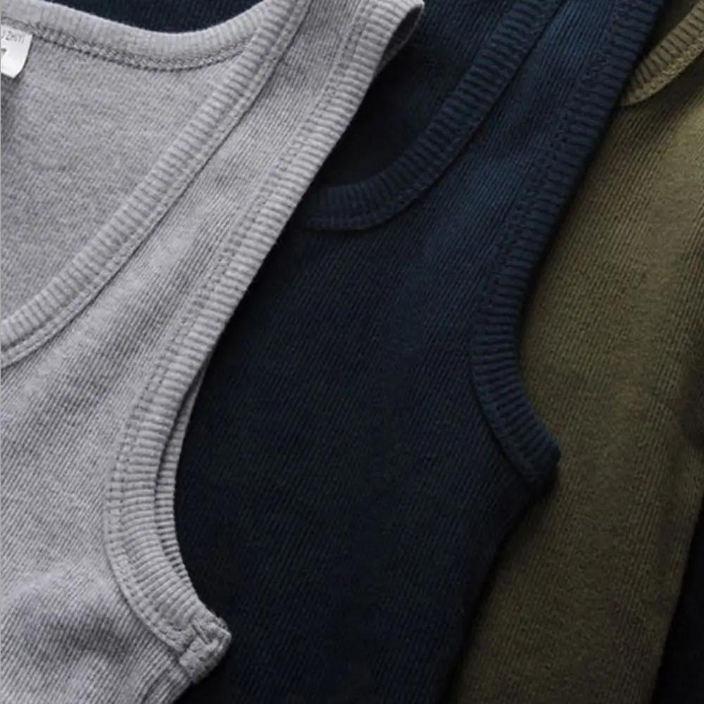 Offre spéciale été hommes vêtements femmes basique élastique débardeur pur coton sans manches hommes