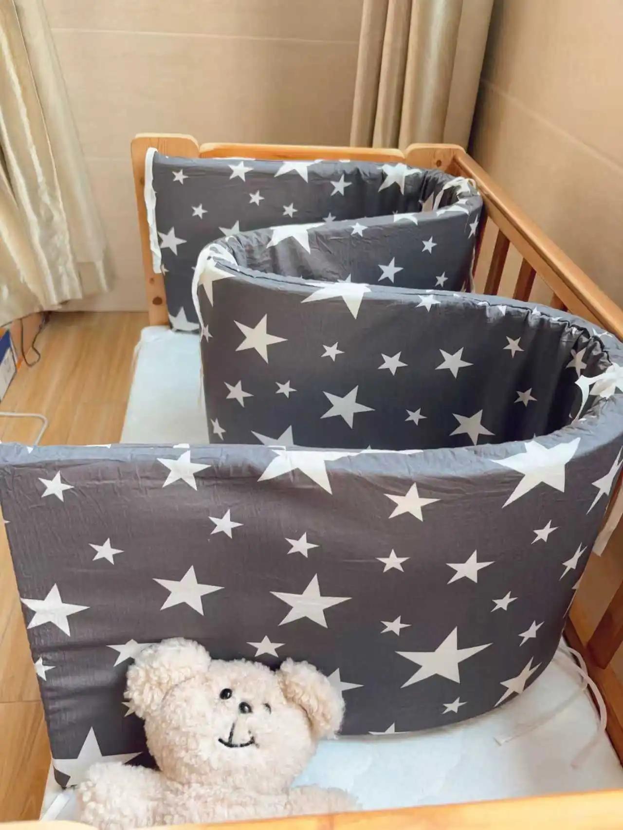 Un protecteur de lit de bébé adapté aux nouveau-nés