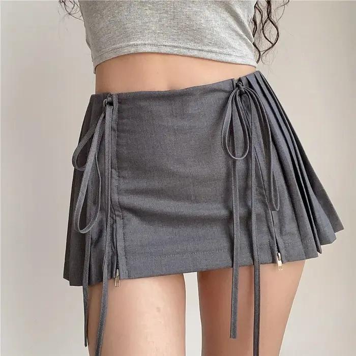 Mini jupe plissée taille haute pour femmes, vêtements de créateurs, fermeture éclair blanche, mode K