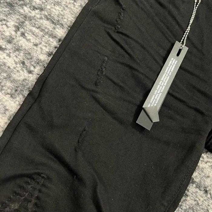 jeans noirs skinny en cuir côtelé pour hommes