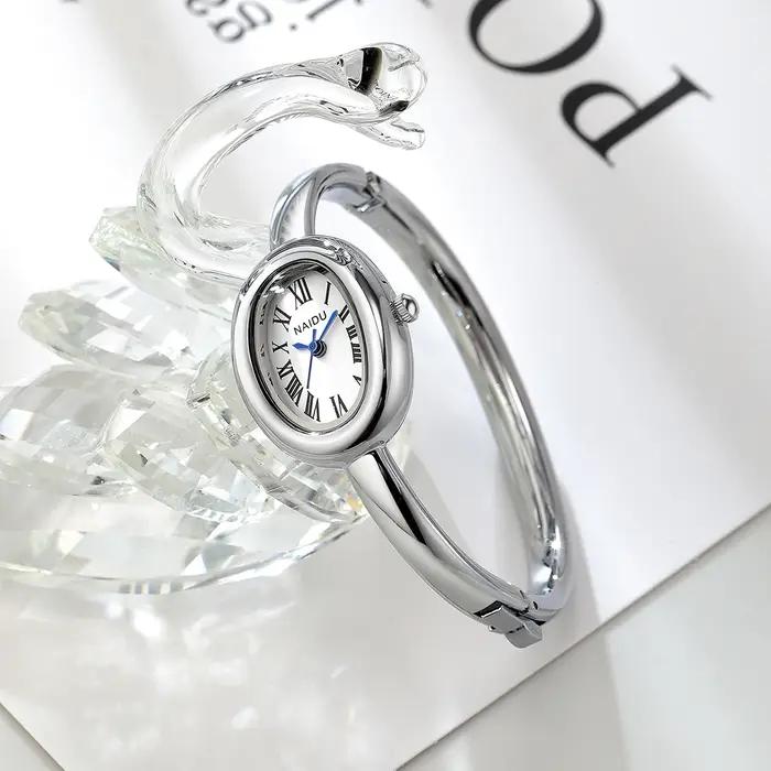Montre pour femme décontractée, polyvalente, simple et à la mode avec affichage à l'échelle romaine