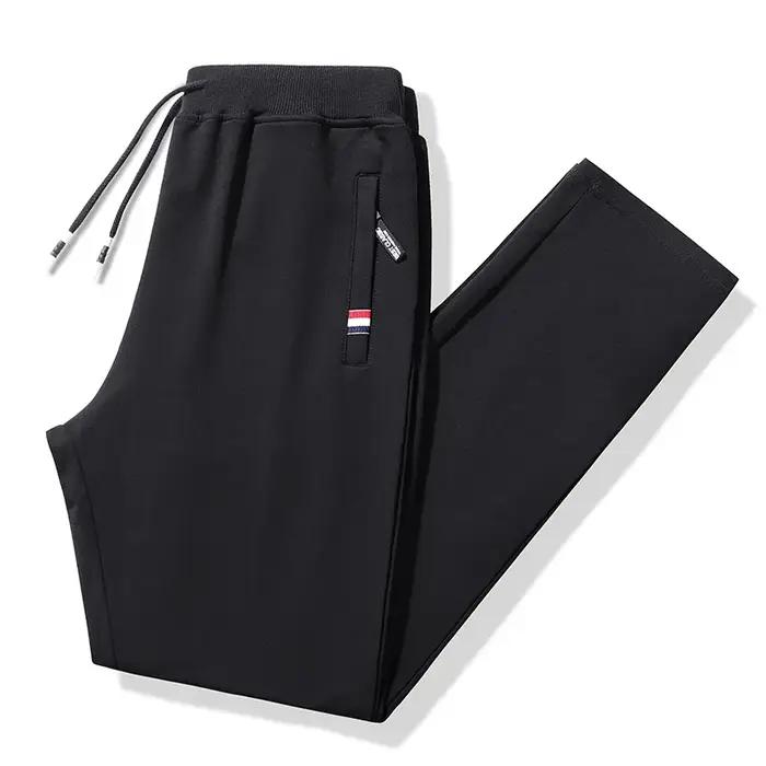 Automne pantalons gymnases amples survêtement pantalons de survêtement hommes 6XL 8XL hommes Fitness