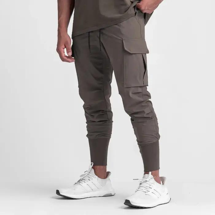 Nouveau pantalon de sport camouflage pour homme, pantalon de fitness d'été fin, ample, à séchage rap