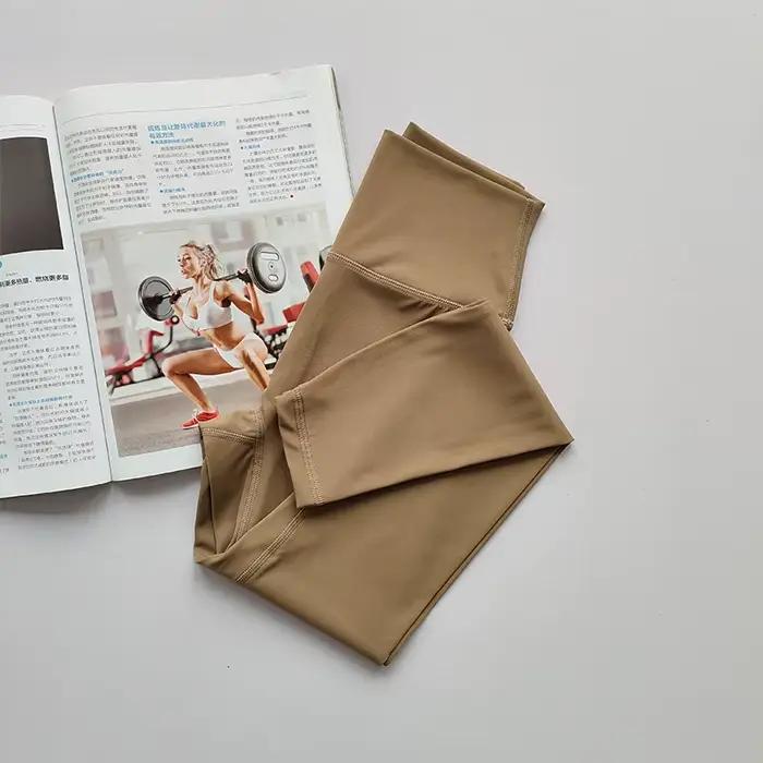 Pantalons de yoga nus taille haute pour femmes portant un ajustement serré levage des hanches Leggin