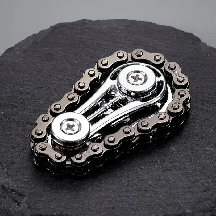 Nouvelles pignons volant d'inertie doigt Gyro Fidget Spinner anti-stress anxiété chaînes de vélo en