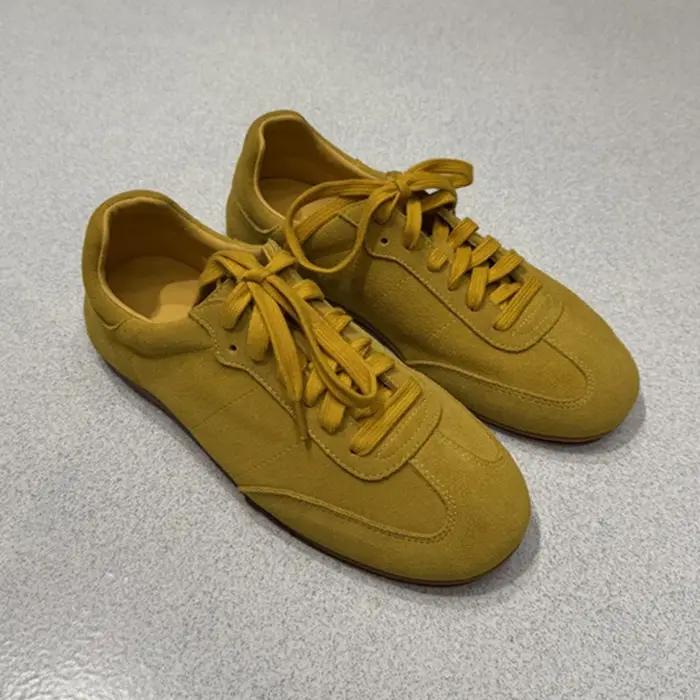 Chaussures d'entraînement allemandes pour femmes 2026 – Nouvelles baskets plates antidérapantes en d