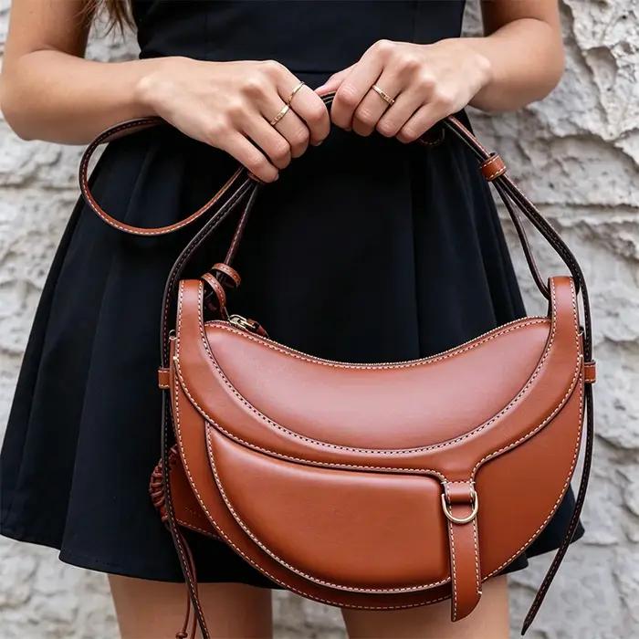 Nouveau sac à bandoulière et sac croisé demi-lune en cuir véritable pour femme 2026, idéal pour le q