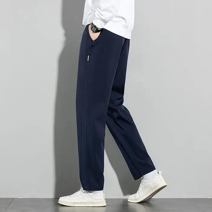 Pantalons pour hommes en soie glacée 2025 été nouveau noir gris mince pantalons décontractés d'affai