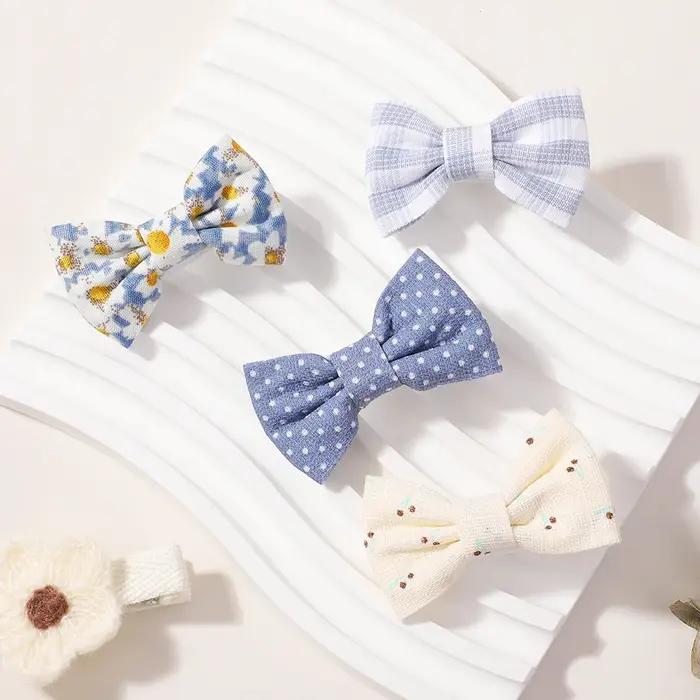 Bébé arcs 20 pièces/ensemble tissu fait à la main imprimé Barrette Boutique Mini Boutique frange arc