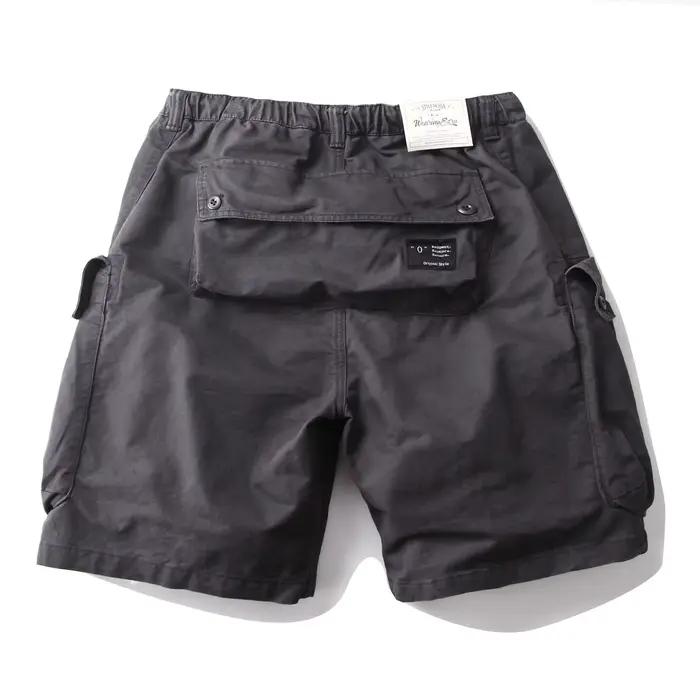 Shorts cargo multi-poches camouflage délavé et vieilli style vintage américain, coupe droite décontr